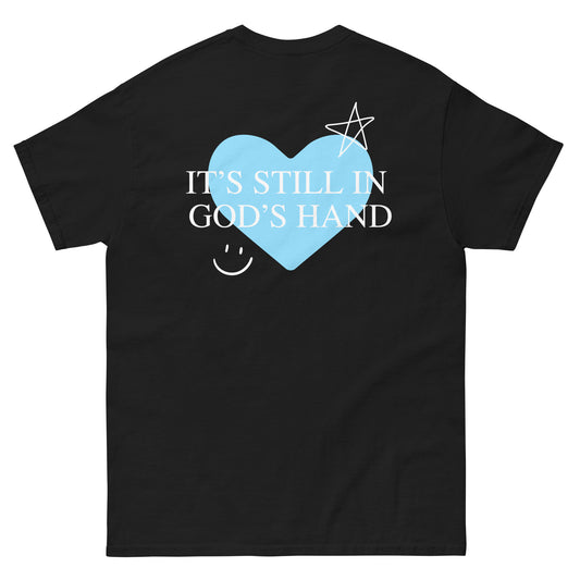 T-Shirt - It's Still In God's Hand